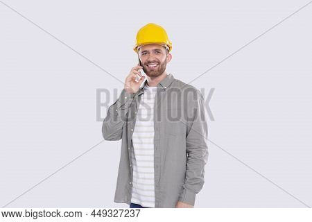 Construction Worker Talking On Phone Standing Isolated. Commecial, Shopping, Advertisment Concept. T