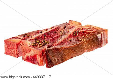 Meat With Pepper . Two Raw Fresh Beef Steaks Ready To Cook.