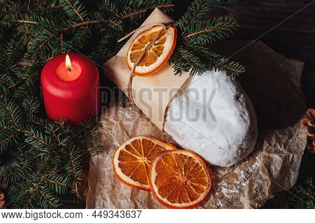 Christmas Stollen On Wooden Background. Traditional Christmas German Dessert Cut Into Pieces. Cake W