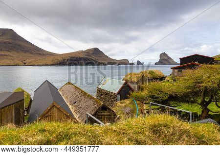 View Of The Bour On Vagar Island. A Small Village Situated On The Slope Of A Hill. Faroe Islands.