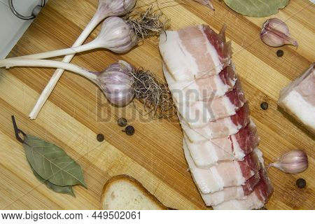Ukrainian Traditional Food Concept With White Bread. Ukrainian Raw Lard With Peppercorn And Garlic,