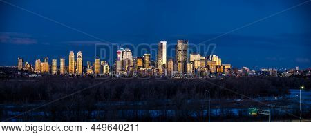 Panoramic View Of Calgary's Skyline At Sunrise.
