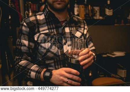 Bartender Holding Shaker And Glass, Mixing Ingredients For Cocktail