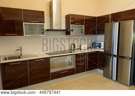 Bukovel, Ukraine February 4, 2022: Kitchen With All Kitchen Utensils In The Hotel.