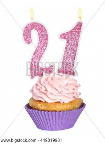 21th Birthday. Delicious Cupcake With Number Shaped Candles For Coming Of Age Party On White Backgro