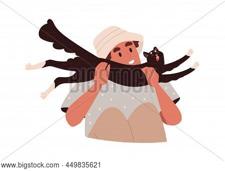 Happy Person Holding Funny Cat In Hands With Love. Pet Owner And Cute Adorable Kitty. Young Smiling 