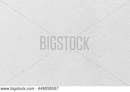 Sample Of A Texture Of White Plaster. Wall Finished With A Decorative Cement Stucco. Example Of Exte