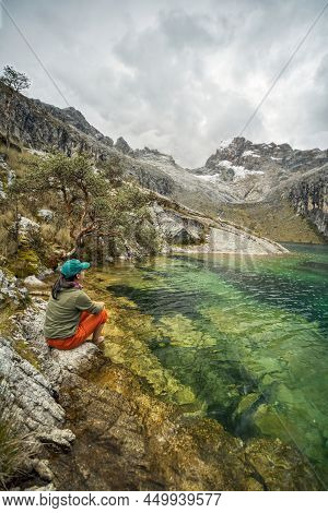 Portrait Photography Of Woman Looking At The Churup Mountain In The Churup Lagoon