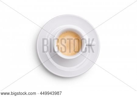 Studio shot of an spresso coffee in a white cup on a saucer taken from above isolated on white background