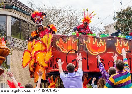 New Orleans, La - February 20: Women Float Riders Tossing Beads At Krewe Of Femme Fatale Parade On S