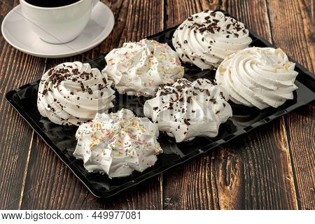 Meringue Cookies Or Beze Cookies With Candy And Chocolate