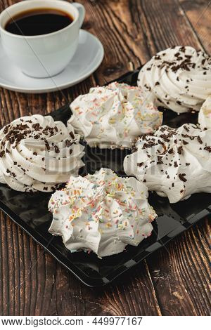 Meringue Cookies Or Beze Cookies With Candy And Chocolate