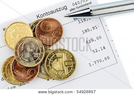 the bank statement and some coins of euro currency