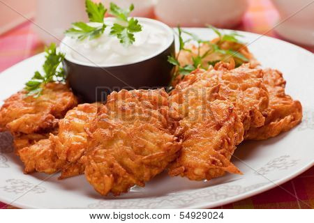 Latkes, hebrew potato pancakes served with sour cream