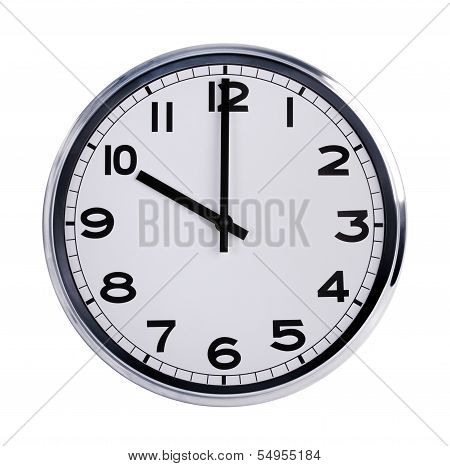 Round Office Clock Shows Ten O'clock