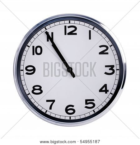 Large Clock Shows Five Minutes To Eleven
