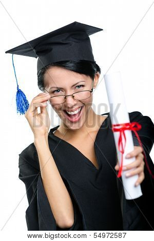 Graduating student in spectacles with the diploma adjusts the spectacles, isolated on white