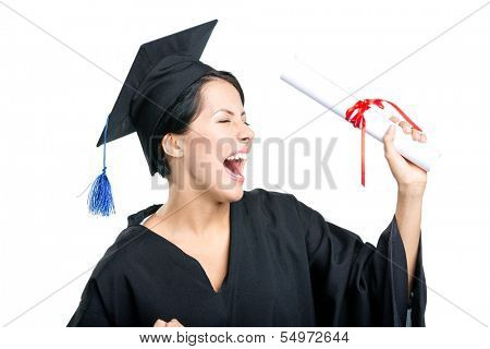 Happy graduating student in the academic gown with the diploma, isolated on white