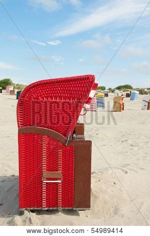 Typical striped chairs on German Borkum at the beach