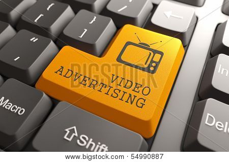Video Advertising on Orange Keyboard Button.