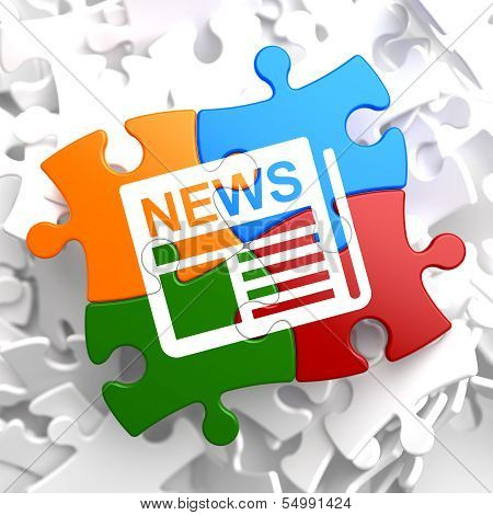 Newspaper with News Title on Multicolor Puzzle.