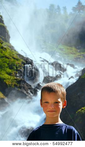 Portrait Boy On Summer Waterfall Background