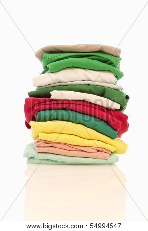 Pile of colorfull shirts isolated
