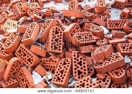 Pile Of New Intact And Beaten Bricks