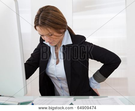 Businesswoman With Back Pain