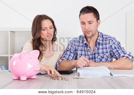 Couple Saving Money