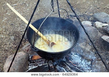 Black Pot On Camp Fire