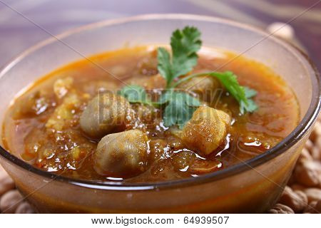 Indian Spicy Chana Masala, Raw Chickpeas Around Bowl