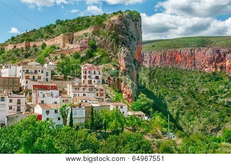 White houses in Chulilla village, ruins of the old castle, placed on the rocks