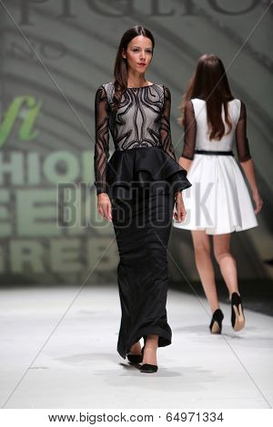 ZAGREB, CROATIA - MAY 09: Fashion model wearing clothes designed by Avaro Figlio on the Zagreb Fashion Week on May 09, 2014 in Zagreb, Croatia.