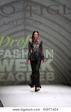 ZAGREB, CROATIA - MAY 09: Fashion model wearing clothes designed by Avaro Figlio on the Zagreb Fashion Week on May 09, 2014 in Zagreb, Croatia.