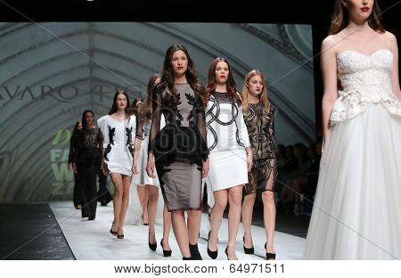 ZAGREB, CROATIA - MAY 09: Fashion model wearing clothes designed by Avaro Figlio on the Zagreb Fashion Week on May 09, 2014 in Zagreb, Croatia.
