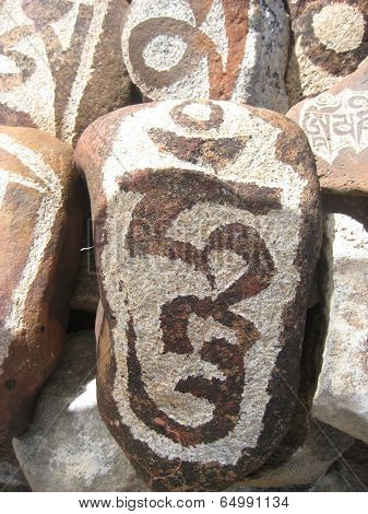 stone carved with symbols of prosperity_23