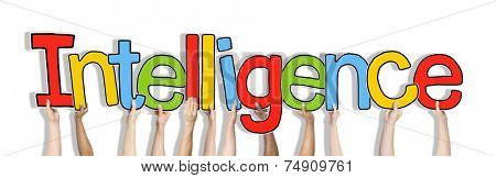 Group of Hands Holding Intelligence Word Concept