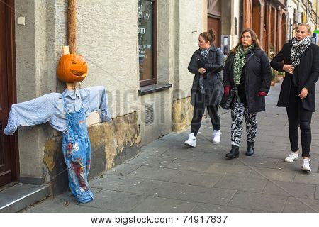 KRAKOW, POLAND - OCT 29, 2014: Unidentified townspeople and scenery for celebrating Halloween in Krakow.