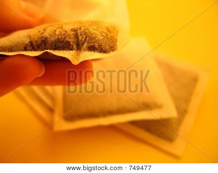 Teabags และมือ