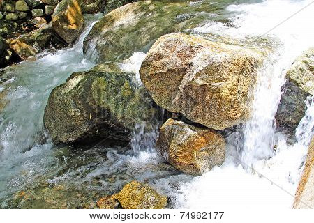 Beautiful Waterfall In Mountains