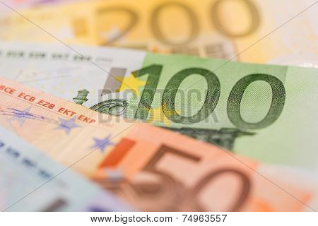 many different euro bills. symbol photo for wealth and investment.