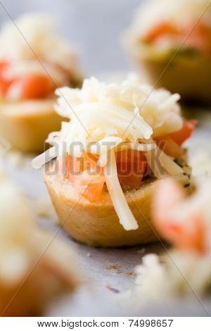 Preparing bruschetta for evening snack