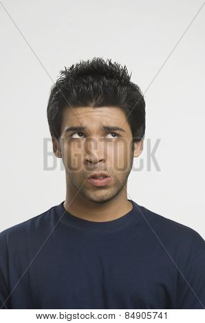 Close-up of a man making a funny face