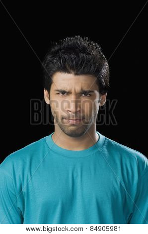 Portrait of a man making a face