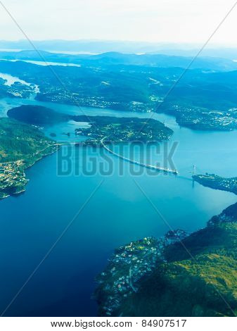 View From Window Of Airplane Flying Over Norway Scandinavia.