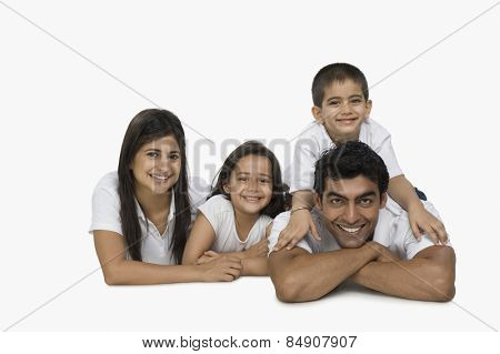 Portrait of parents with their children smiling