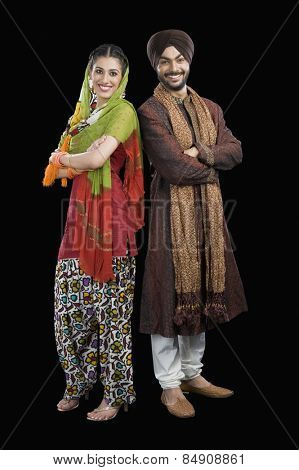 Portrait of a Sikh couple smiling
