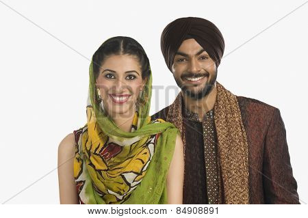 Sikh couple smiling