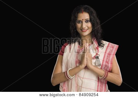 Portrait of a Bengali woman greeting
